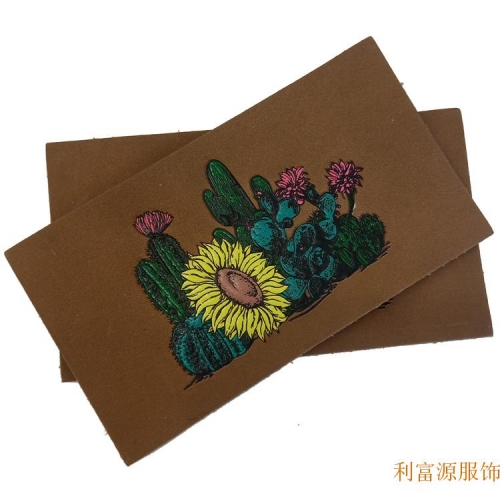 厂家直销真皮皮标、特种电压标,彩色油印电压皮标